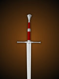 Close-up of Geralt's Steel Sword hilt with red wrapped grip