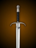 Close up of Longclaw Sword wolf head pommel and hilt detail