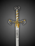 Close up of ornamental sword beast shaped guard and serpent wrapped grip