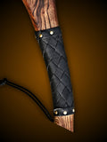 Close up of Raider's Axe wooden handle and grip wrapping