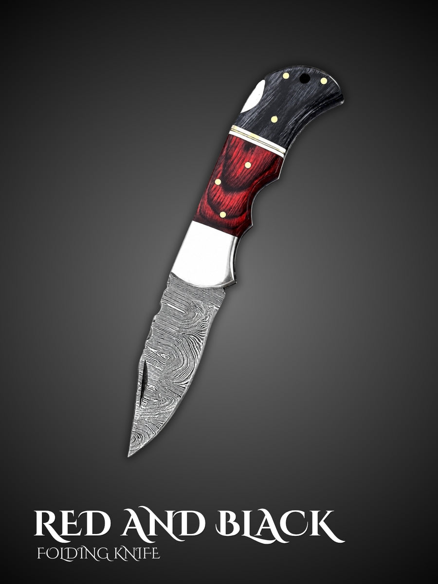 Red and black handmade Damascus steel folding pocket knife, full view