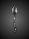 Close up of Viking cutlery spoon with twisted iron handle