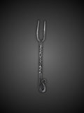Close up of Viking cutlery two tined fork with forged handle